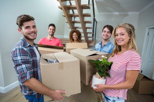Professional removalists packing a living room in Manandvan Norbury