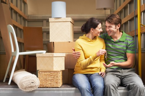 Professional movers handling a moving truck in Norbury